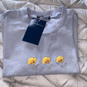 Brandy Melville baby blue flower cropped tee